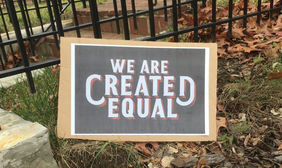 "We are created equal" sign